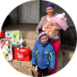 A young family receive provisions