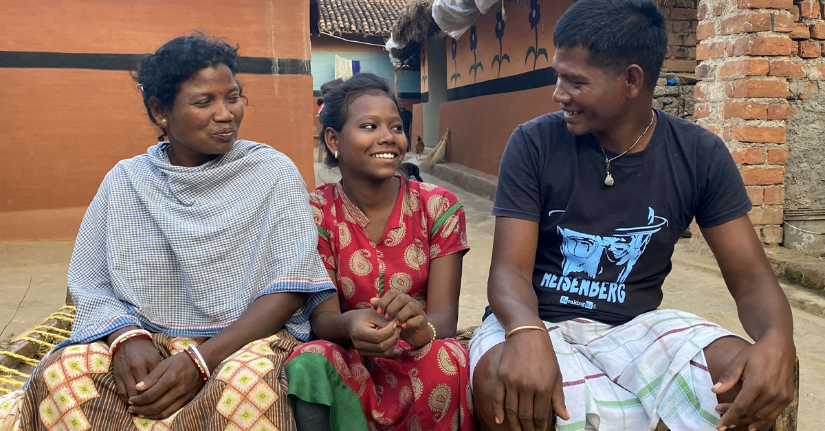 Devi smiling with family