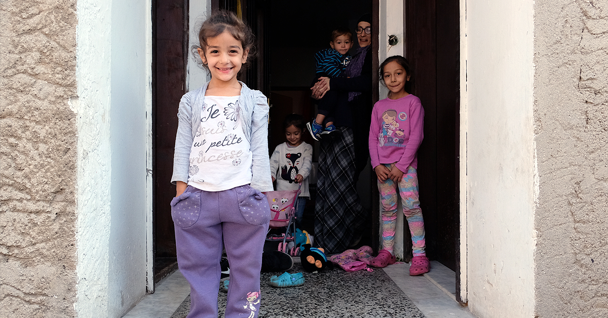 Esmeralda at home with her children
